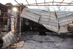 Сгоревшие постройки во дворе частного дома. Село Масанчи, Жамбылская область. 26 февраля 2020 года.