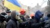 A group of protesters march through Kyiv on December 1.