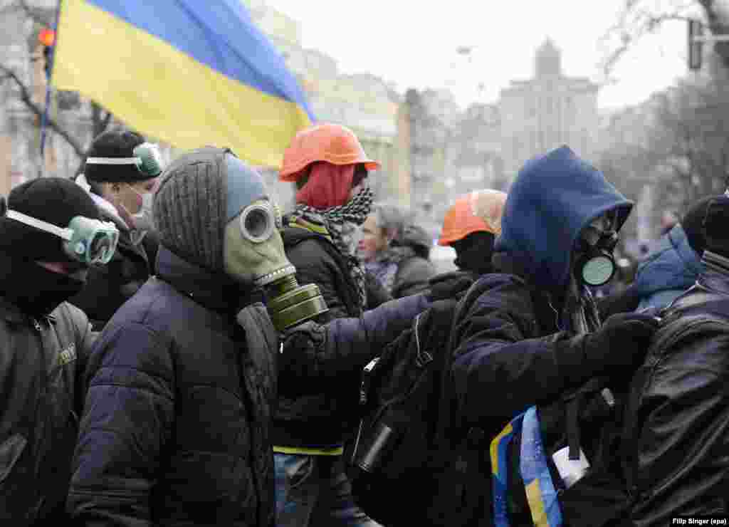 A group of protesters march through Kyiv on December 1.