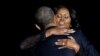 U.S. - U.S. President Barack Obama embraces his wife Michelle Obama after his farewell address in Chicago, Illinois, U.S. January 10, 2017