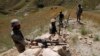 Afghan border police hold their positions in the Goshta district of Nangarhar Province, where Afghanistan shares a frontier with Pakistan.