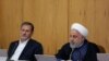 Iran - President Hassan Rouhani (R) and VP Es'haq Jahangiri in government cabinet meeting. August 14, 2019
