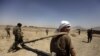 Afghan and U.S. soldiers patrolling the village of Jellawar in the Arghandab district in early September.