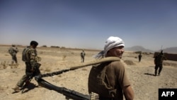 Afghan and U.S. soldiers patrolling the village of Jellawar in the Arghandab district in early September.