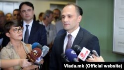 Health Minister Venko Filipce says officials must "work to restore trust" with health-care professionals.