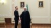 Iranian President Hassan Rouhani shakes hands with German Foreign Minister Heiko Maas during a meeting in Tehran, Iran, June 10, 2019. Official Iranian President website/Handout via REUTERS