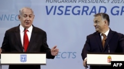 Kryeministri hungarez, Viktor Orban (djathtas), dhe homologu i tij izraelit, Benjamin Netanyahu, në Budapest, korrik 2017.