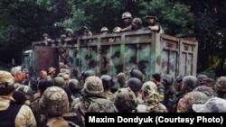Бійці батальйону спеціального призначення НГУ «Донбас» перед першим штурмом міста Іловайськ. 10 серпня 2018 року