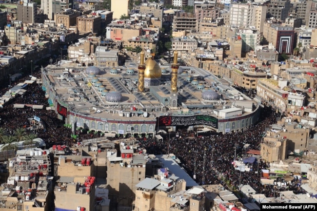 A general view shows the Imam Abbas shrine as Iraqi Shiites make their way to commemorate the Arbaeen religious festival which marks the 40th day after Ashura, commemorating the seventh century killing of the Imam, in the holy city of Karbala, Oct 2018