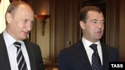 Russia's Prime Minster Vladimir Putin (left) and President Dmitry Medvedev -- more victims of the global economic crisis?