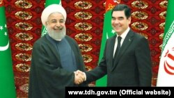 Eýranyň prezidenti Hassan Rohani we Türkmenistanyň prezidenti Gurbanguly Berdimuamedow