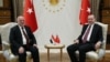 Turkish President Recep Tayyip Erdogan (right) meets with Iraqi Prime Minister Haidar al-Abadi at the Presidential Palace in Ankara on October 25.