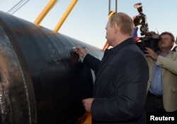 Владимир Путин на открытии первого сегмента трубопровода "Сила Сибири", 1 сентября 2014.
