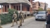 Kosovo: Police are seen in front of Jakup Krasniqi house 