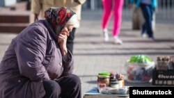 A woman sells homemade canned food on the street in Kaliningrad.