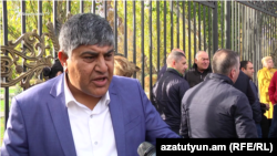 Traders protest in front of parliament in Yerevan on November 14.