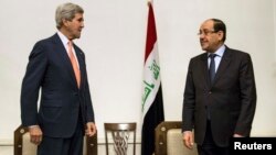رئيس الوزراء نوري المالكي ووزير الخارجية جون كيري في بغداد - 23 حزيران 2014