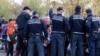 Bosnian Police Scuffle With Migrants At Border With Croatia