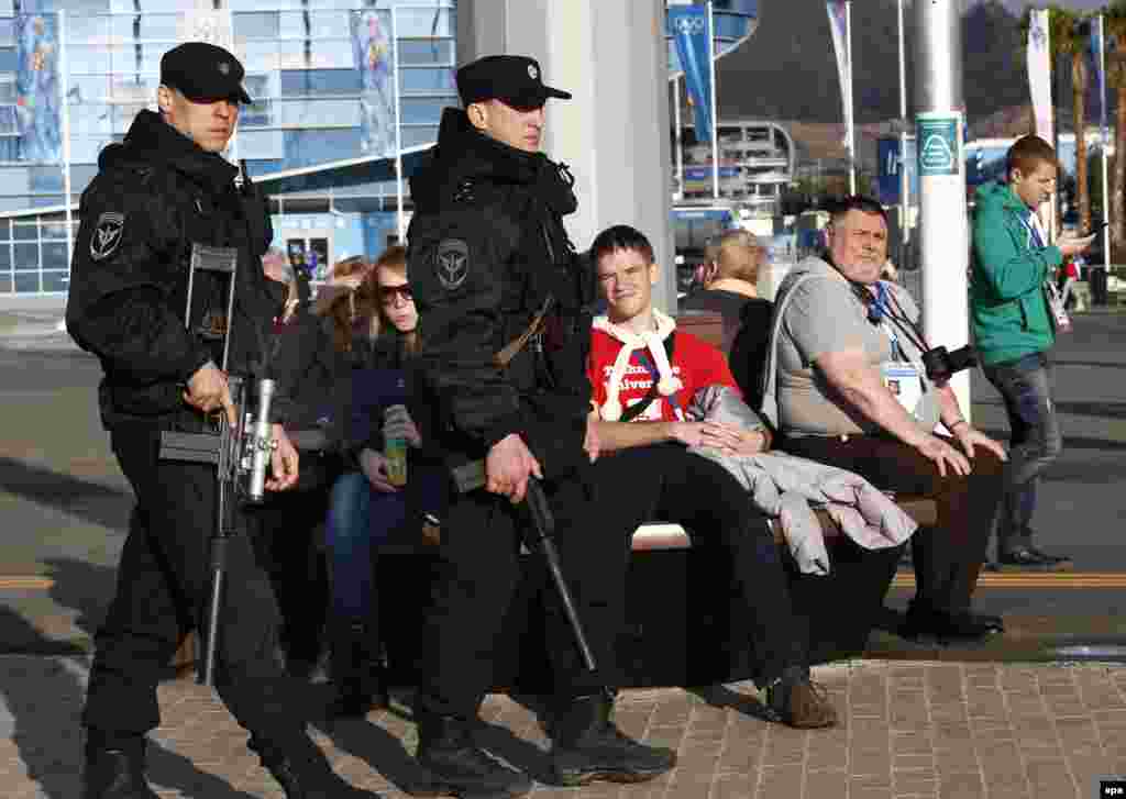 Police snipers patrol Olympic Park in Sochi. (EPA/Barbara Walton)