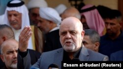 FILE - Iranian ambassador to Iraq, Iraj Masjedi, speaks during a news conference in Basra, September 11, 2018