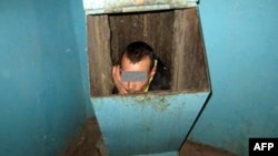 This Russian man had to be rescued from a trash chute after trying to escape his girlfriend.