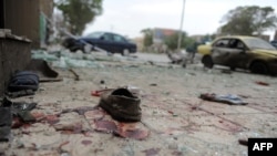 Footwear is pictured amid broken glass at the scene of a bomb blast in Mazar-e Sharif. (file photo)
