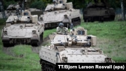 Swedish armored units train with a U.S. company as part of preparations for field exercises in Skovde in 2017, Sweden's largest joint field exercise with NATO in 20 years.
