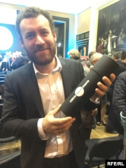 Chapple with his Czech Press Photo award certificate at the ceremony on 21 November