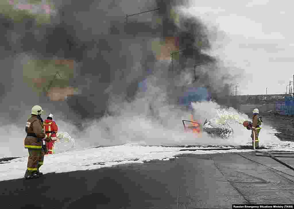 Firefighters battle a blaze that erupted at a power plant in a metallurgical facility near the industrial Arctic city of Norilsk after a tank collapsed and caused fuel to combust.&nbsp;