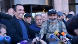 Armenia - Businessman Gagik Tsarukian (L) and protest leader Nikol Pashinian speak to reporters in Yerevan, 2 May 2018.