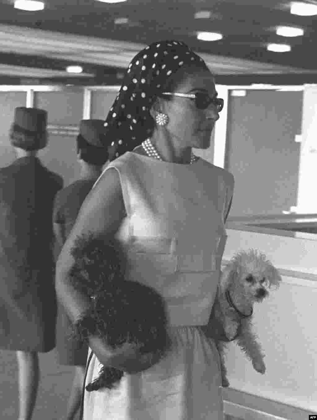 Callas holding her two favorite dogs at Orly airport in Paris on January 9, 1966