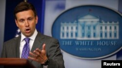 U.S. -- White House Deputy Press Secretary Josh Earnest speaks to media during the daily briefing at the White House in Washington, August 21, 2013.