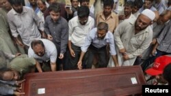 Shahzad's burial in Karachi, June 1