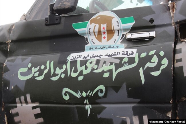 Дверь одной из "техничек" "Южного фронта" оппозиционной группировки "Сирийская свободная армия"