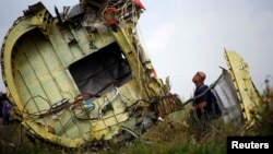 Рештки літака«Боїнг-777» рейсу MH17 на Донбасі