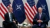 Then-Vice President Joe Biden meets with NATO Secretary-General Jens Stoltenberg (left) during the Munich Security Conference in Munich in February 2015.