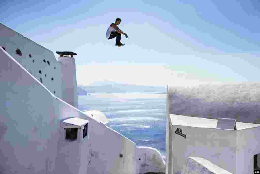 Aleksandr Baiturin of Russia practices for the Red Bull Art of Motion, a free-running event on the Greek island of Santorini. (epa/Samo Vidic)