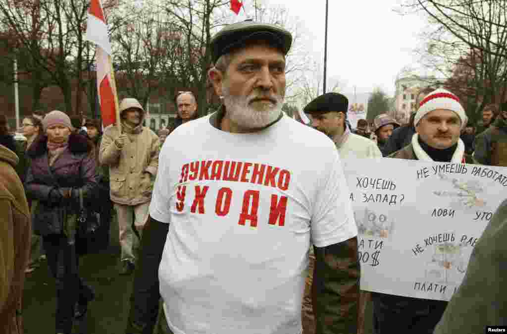 Yury Rubtsou wears a T-shirt that reads "Lukashenka go away" as he takes part in a rally to remember the victims of Soviet dictator Joseph Stalin's regime, in Minsk on November 3. (Reuters/Vasily Fedosenko)