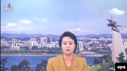 A newsreader of North Korea's official KCNA-TV reports the statement by the Foreign Ministry rejecting a UN Security Council statement condemning the North's recent rocket launch.