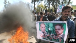 Supporters of former Prime Minister Nawaz Sharif protest against the Supreme Court verdict in Islamabad.