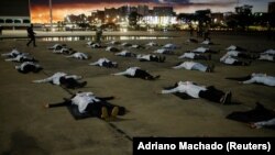 Акция бразильских медсестер, вспоминающих коллег, заразившихся коронавирусом от пациентов и погибших. Бразилия, 12 мая