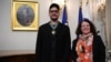 Kirill Serebrennikov (left) poses with French Ambassador Sylvie Bermann at the French Embassy in Moscow on October 14.