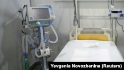 An Aventa-M ventilator next to a bed inside a temporary hospital set up amid the coronavirus outbreak on the outskirts of Moscow in May