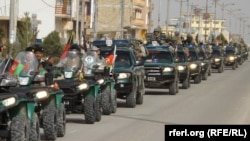 FILE: Afghan police display their vehicles during a parade in Mazar-e Sharif, the capital of Balkh province in March 2017. 