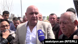 Armenia -- Multi Group's CEO Sedrak Arustamian meets with protesting workers of the Ararat Tsement plant, April 15, 2019.