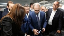 Armenia -- Prime Minister Nikol Pashinian (C) visits new textile factories opened by businessman Samvel Aleksanian (R), Yerevan, November 1, 2019.