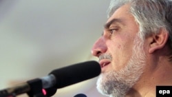 Abdullah Abdullah speaks to supporters during a meeting in Kabul on August 21.