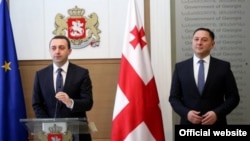 Уже второй раз в течение этого года премьер-министру Грузии Ираклию Гарибашвили приходится представлять кандидатуру Вахтанга Гомелаури на руководящую должность