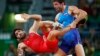 Soslan Ramonov of Russia (in blue) defeated Toghrul Asgarov of Azerbaijan to win the gold medal in the 65-kilogram weight class of men&#39;s freestyle wrestling. Uzbekistan&#39;s Ikhtiyor Navruzov&nbsp;took bronze.