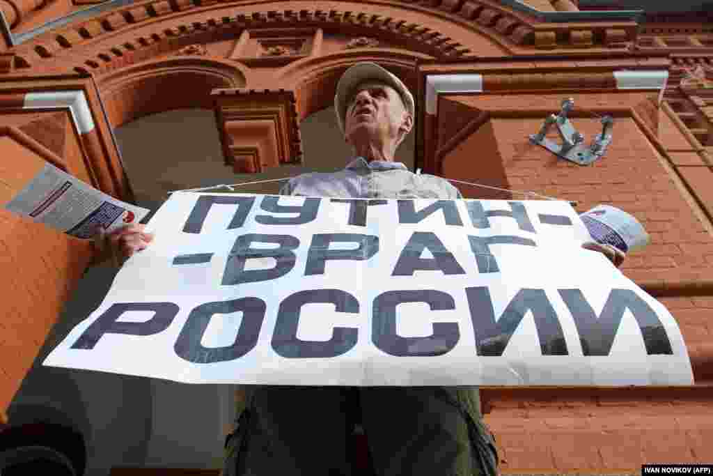 ''Putin - neprijatelj Rusije'', Moskva, 18. juli 2013. Foto: AFP / Ivan Novikov 